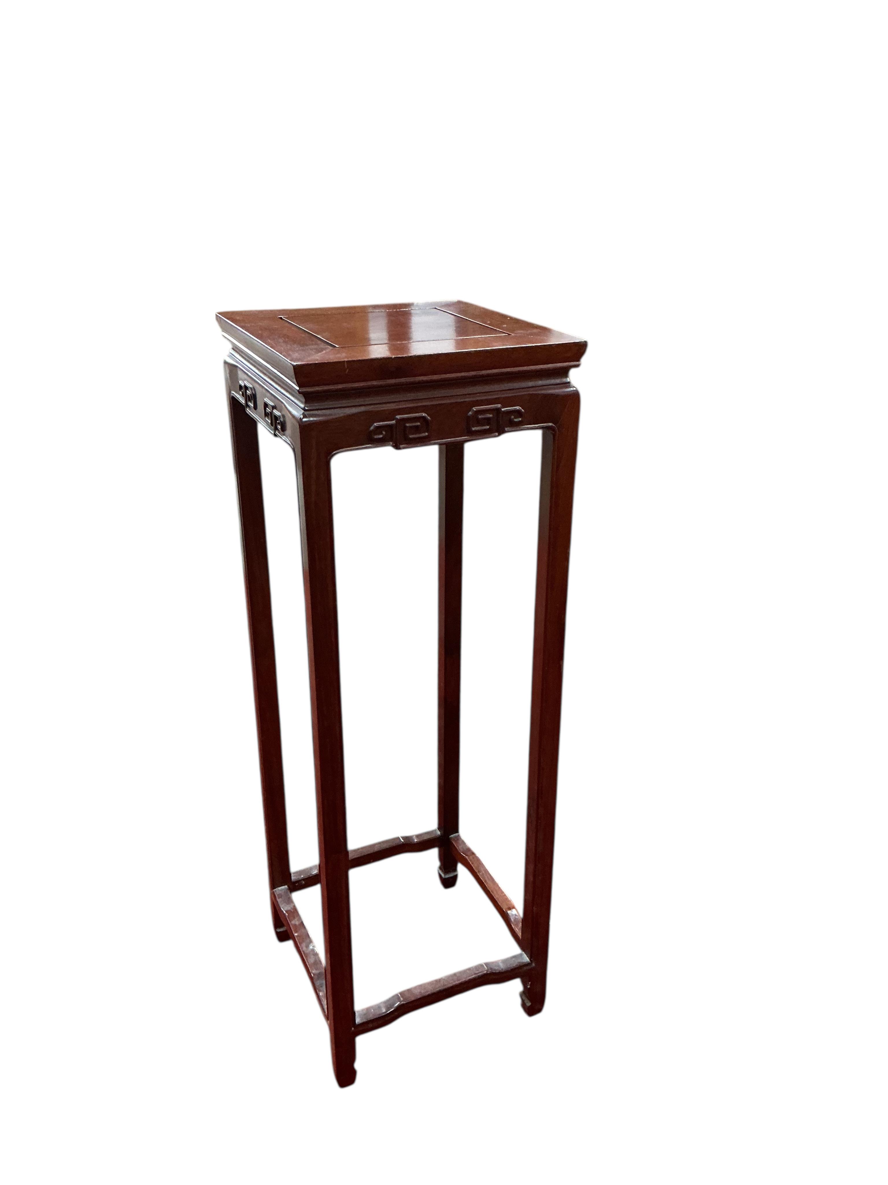 A Chinese hardwood vase stand, width 30cm, height 91cm